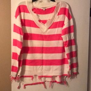 Hot pink and white striped deconstructed sweater.